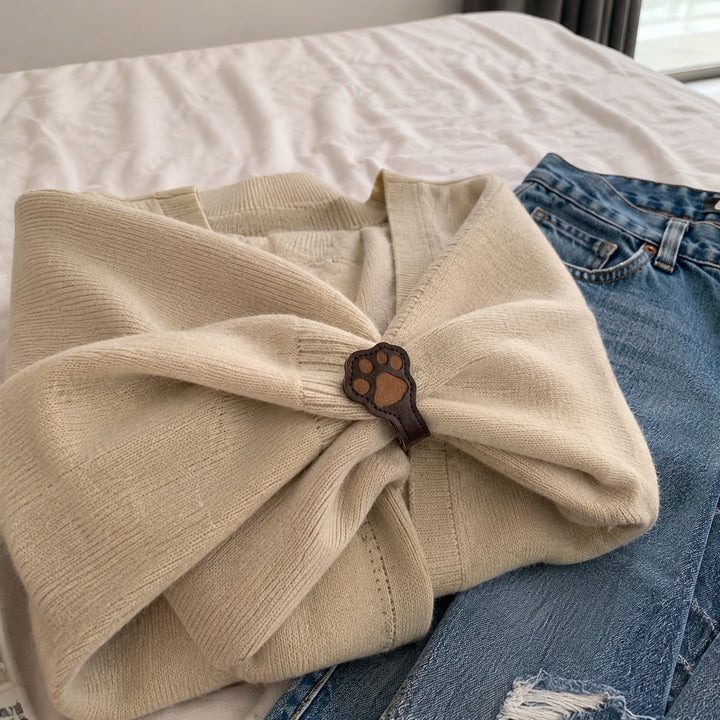 Cat paw shaped magnetic snaps for cuffs and pant legs