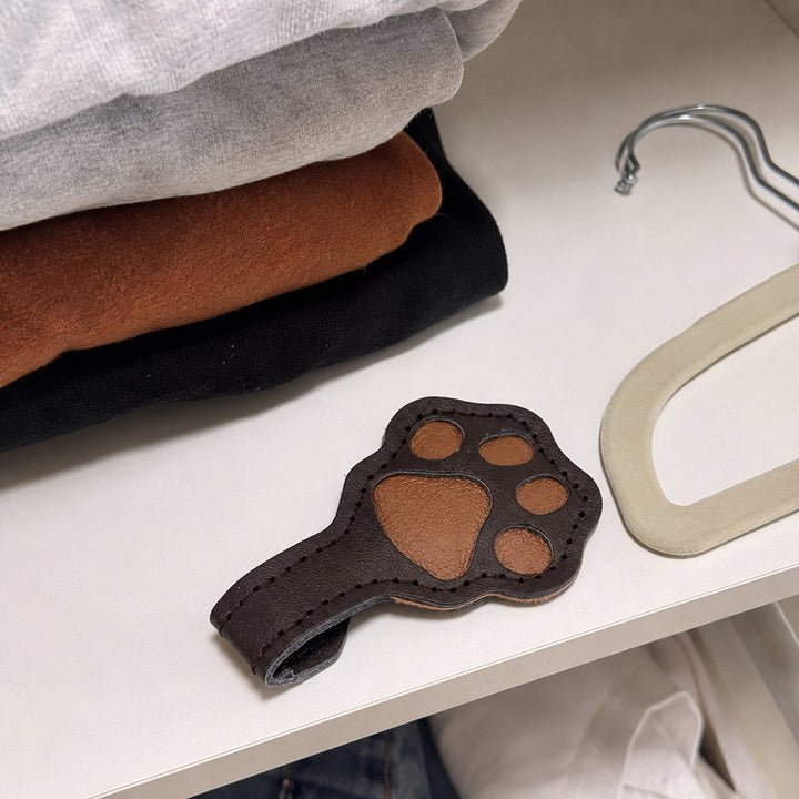 Cat paw shaped magnetic snaps for cuffs and pant legs