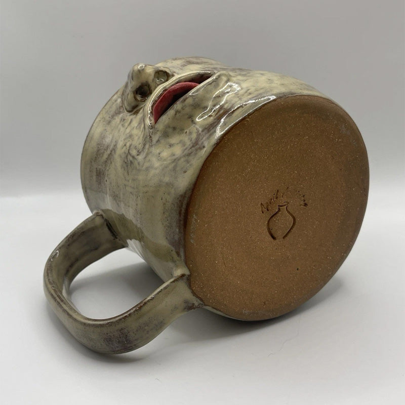 Fun tongue-out ceramic cup