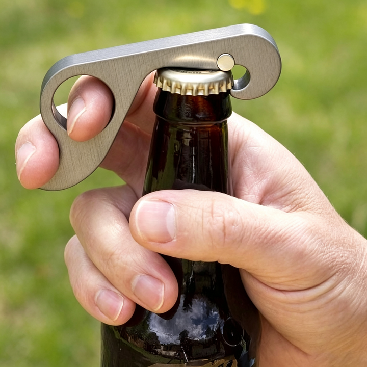 One-handed magnetic metal bottle opener