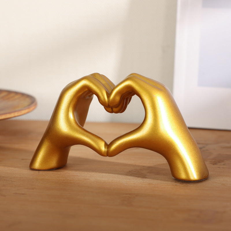 Heart-shaped hand ornament
