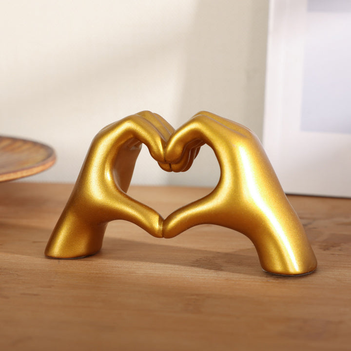 Heart-shaped hand ornament