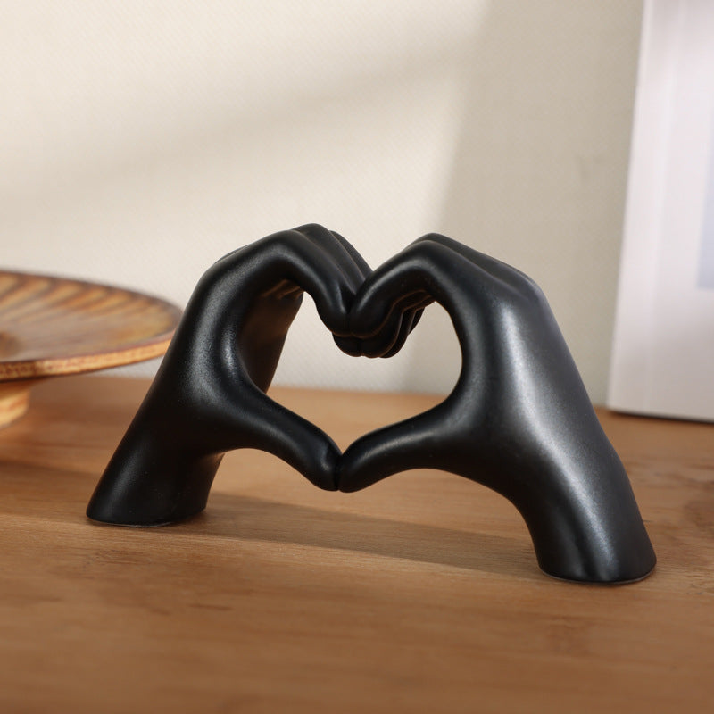 Heart-shaped hand ornament