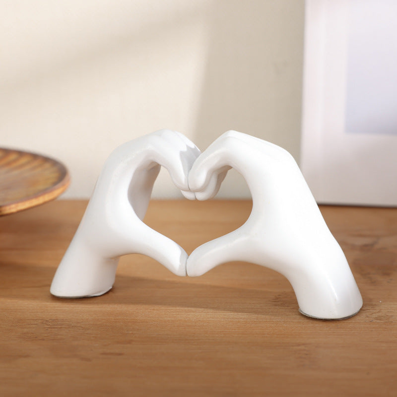 Heart-shaped hand ornament