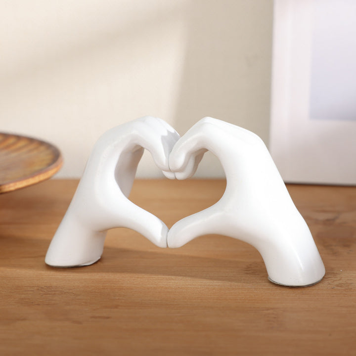 Heart-shaped hand ornament