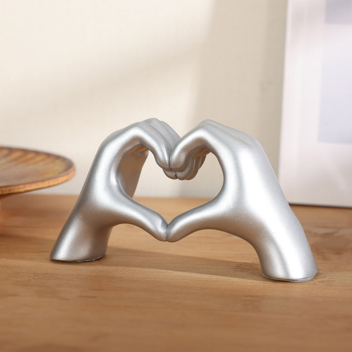 Heart-shaped hand ornament